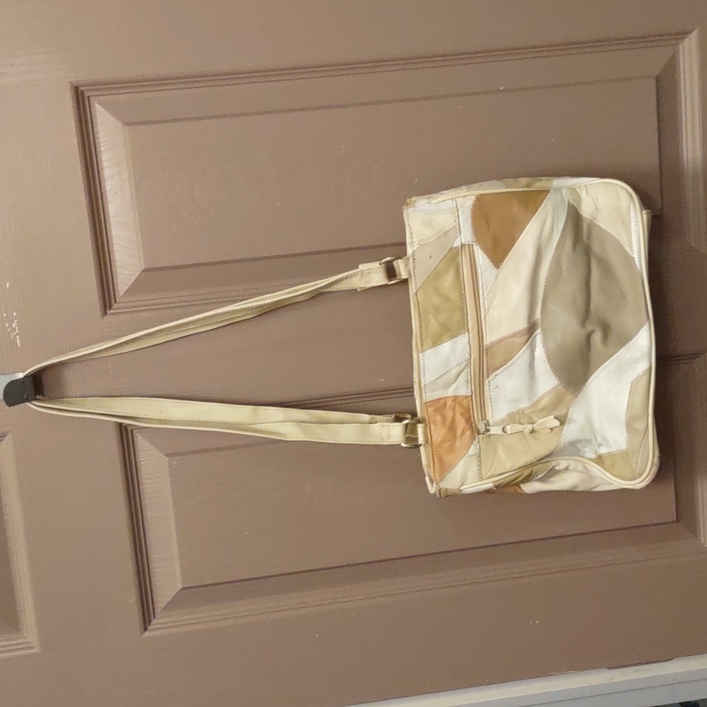 Purse, 10 inches long, 9 inches tall, 4 inches wide